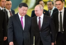 China Hosts Putin As It Projects Stability Post-Trump Visit