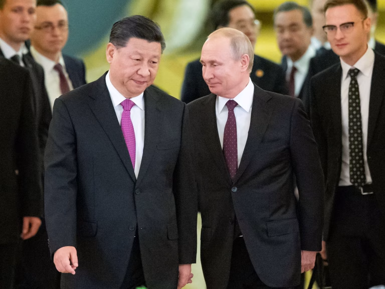 China Hosts Putin As It Projects Stability Post-Trump Visit